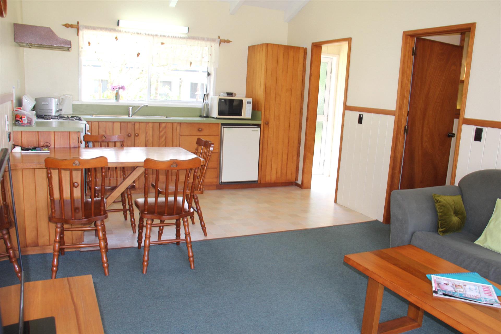 Open-plan apartment living, dining and kitchen area